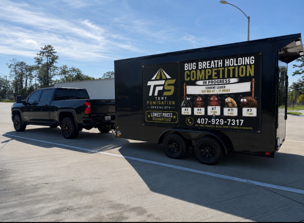 Tent Fumigation Specialists truck and enclosed freezer trailer with branded wrap